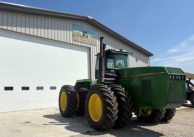Tractor in Front of Garage